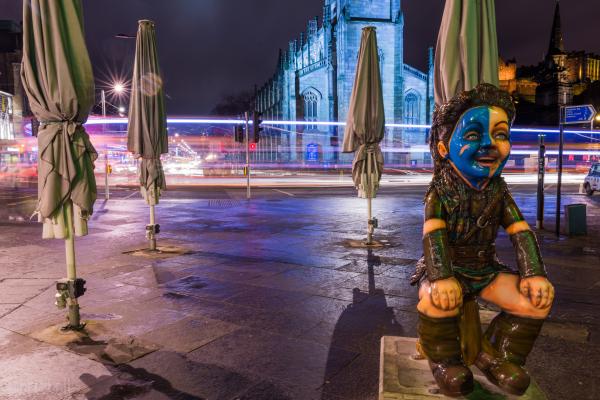 scots statue at night